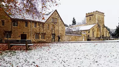 St Cross Church and Holywell Manor in the snow